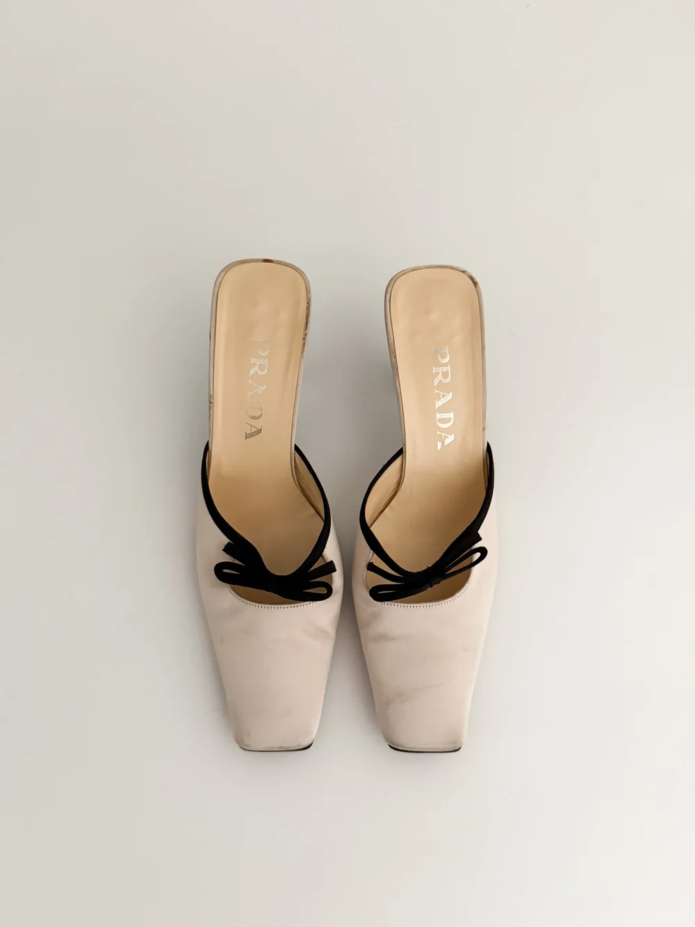 Prada Vintage Ivory & Black Satin Bow Mule Heels (IT 36.5) — sororité.